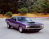 AUT 23 RK0971 01
1970 Dodge Challenger T/A Purple 3/4 Front View On Pavement By Trees
