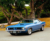 AUT 23 RK0973 02
1972 Plymouth Cuda Blue 3/4 Front View On Pavement By Trees