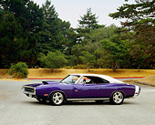 AUT 23 RK0979 02
1970 Dodge Charger RT/SE Purple 3/4 Side View On Pavement By Trees