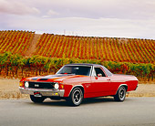 AUT 23 RK1024 03
1972 Chevrolet, El Camino SS, Orange Black Stripe 3/4 Front View On Pavement By Vineyard