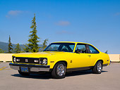 AUT 23 RK1033 01
1976 Chevrolet Nova SS Yellow Low 3/4 Front View On Pavement