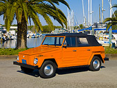AUT 23 RK1052 01
1974 Volkswagen Thing Type 181 Orange 3/4 Side View On Pavement By Harbor