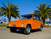 AUT 23 RK1053 01
1974 Volkswagen Thing Type 181 Orange Low 3/4 Front View On Pavement By Harbor