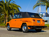 AUT 23 RK1054 01
1974 Volkswagen Thing Type 181 Orange Low 3/4 Rear View On Pavement By Harbor