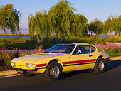 AUT 23 RK1068 01
1974 Volkswagen SP2 Ivory Front 3/4 View On Pavement By Trees
