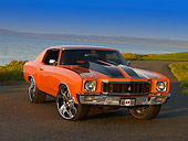 AUT 23 RK1160 01
1971 Chevrolet Monte Carlo Orange Black Stripe Low 3/4 Front View On Pavement