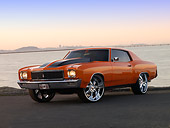 AUT 23 RK1161 01
1971 Chevrolet Monte Carlo Orange Black Stripe Low 3/4 Front View On Pavement