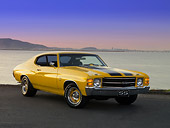 AUT 23 RK1172 01
1971 Chevrolet Chevelle Yellow Black Strip 3/4 Front View On Pavement