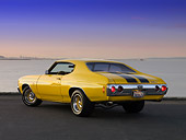 AUT 23 RK1173 01
1971 Chevrolet Chevelle Yellow Black Strip 3/4 Rear View On Pavement
