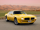 AUT 23 RK1571 01
1971 Pontiac Firebird Trans Am Yellow Low 3/4 Front View On Pavement