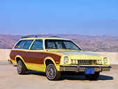AUT 23 RK1595 01
1977 Ford Pinto Wagon Chartreuse With Woodgrain Side Paneling 3/4 Front View On Pavement By Hills Sky