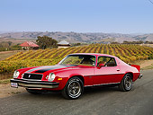 AUT 23 RK1602 01
1974 Chevrolet Camaro Z-28 Red 3/4 Front View On Pavement By Vineyard