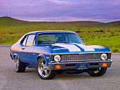 AUT 23 RK1612 01
1971 Chevrolet Nova Blue 3/4 Front View On Gravel By Hill