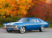 AUT 23 RK1614 01
1971 Chevrolet Nova Blue 3/4 Front View On Pavement By Trees