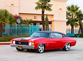 AUT 23 RK1619 01
1972 Chevrolet Chevelle SS Red 3/4 Front View On Pavement By Building