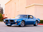 AUT 23 RK1632 01
1972 Pontiac Trans Am Blue 3/4 Front View On Pavement By Building