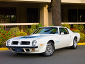 AUT 23 RK1634 01
1974 Pontiac Trans Am White 3/4 Front View On Pavement By Building