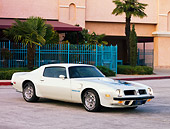 AUT 23 RK1635 01
1974 Pontiac Trans Am White 3/4 Front View On Pavement By Building