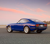 AUT 23 RK1648 01
1971 Datsun 240Z Blue 3/4 Rear View On Pavement At Dusk