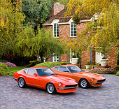 AUT 23 RK1667 01
1972 & 1973 Datsun 240Z Orange 3/4 Front View On Driveway