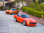 AUT 23 RK1668 01
1972 & 1973 Datsun 240Z Orange 3/4 Front View On Driveway