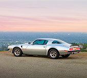 AUT 23 RK1706 01
1975 Pontiac Firebird Trans Am Silver 3/4 Rear View On Pavement