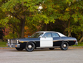 AUT 23 RK1728 01
1977 Dodge Monaco Black And White 3/4 Front View On Road By Trees