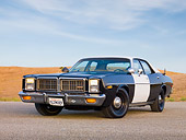 AUT 23 RK1732 01
1977 Dodge Monaco Black And White 3/4 Front View On Pavement By Hills