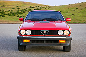 AUT 23 RK1746 01
1981 Alfa Romeo GTV6 Coupe Red Front View On Pavement By Hills