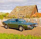 AUT 23 RK1778 01
1971 Plymouth GTX Green 3/4 Front View On Dirt By Fence And Barn