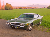 AUT 23 RK1784 01
1971 Plymouth GTX Green 3/4 Front View On Dirt By Grass