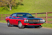 AUT 23 RK1813 01
1970 Dodge Challenger T/A 340 Six Pak Red And Black 3/4 Front View On Pavement By Hills