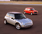 AUT 24 RK0127 01
2002 BMW Mini Cooper Silver & 1982 Austin Mini 1000 Firemist Orange On Pavement