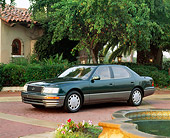 AUT 25 RK0043 02
1996 Lexus LS400 Green 3/4 Side View On Brick Driveway And Trees