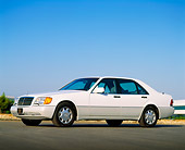 AUT 25 RK0209 01
1992 Mercedes-Benz Sedan White Low 3/4 Side View On Pavement Blue Sky