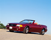 AUT 25 RK0223 02
1991 Mercedes Benz 500SL Convertible Burgundy 3/4 Side On Pavement Hill Blue Sky