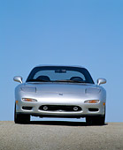 AUT 25 RK0477 02
1992 Mazda RX7 Silver Head On Shot On Pavement Blue Sky