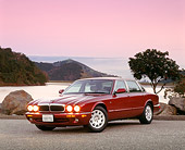 AUT 25 RK0606 01
1998 Jaguar XJ8 Red 3/4 Front View On Pavement By Water Filtered