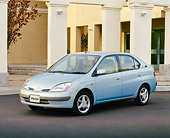 AUT 25 RK0969 03
Toyota Prius Hybrid Blue Front 3/4 View On Pavement By Pillars