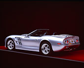 AUT 25 RK1126 06
1999 Shelby Series 1 Convertible Silver 3/4 Rear View On Red Floor Gray Line Studio