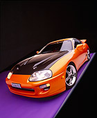 AUT 25 RK1268 17
1995 Toyota Supra Custom Orange And Black Wide Angle 3/4 Front View On Purple Floor Gray Line