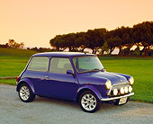 AUT 25 RK1419 02
1998 Rover, Mini, Blue 3/4 Side View On Pavement By Grass And Trees