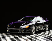 AUT 25 RK0020 01
1997 Mitsubishi 3000GT Black 3/4 Front View On Checkered Floor Studio