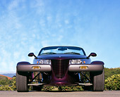 AUT 25 RK0071 02
1998 Plymouth Prowler Roadster Burgundy Low Head On Shot On Pavement Blue Sky