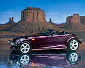 AUT 25 RK0079 06
1998 Plymouth Prowler Roadster Burgundy 3/4 Side View On Mylar Floor Rock Mountains Studio