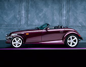 AUT 25 RK0080 01
1998 Plymouth Prowler Roadster Burgundy Side View On Purple Line Gray Backgrond Studio