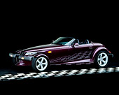 AUT 25 RK0083 04
1998 Plymouth Prowler Roadster Burgundy 3/4 Side View On Checkered Floor Studio