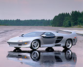 AUT 25 RK0132 04
1996 Vector M-12 Silver 3/4 Side View On Wet Pavement Gray Skies