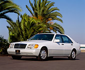 AUT 25 RK0206 03
1992 Mercedes-Benz 300SE White 3/4 Front View On Pavement By Palm Trees