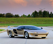 AUT 25 RK0272 04
1996 Vector M-12 Champagne Front 3/4 View On Pavement Grass And Trees